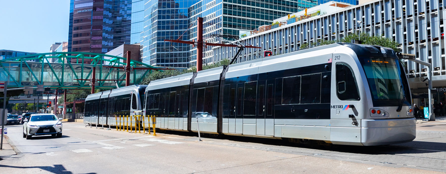 METRORail train coming down the tracks at the Texas Medical Center.